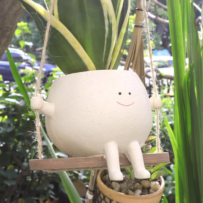 Charming Resin Face Planter with Swing