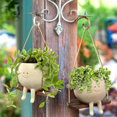 Charming Resin Face Planter with Swing