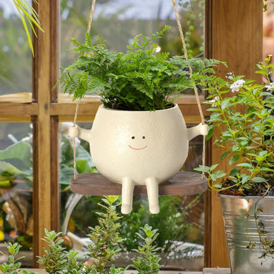 Charming Resin Face Planter with Swing